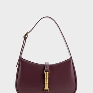 Charles & Keith Burgundy Shoulder Bag with Gold Accent